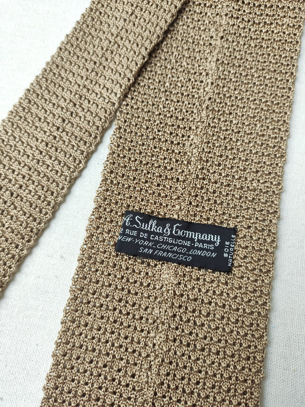 A. Sulka & Company cravate beige vintage en tricot de soie Made in Italy